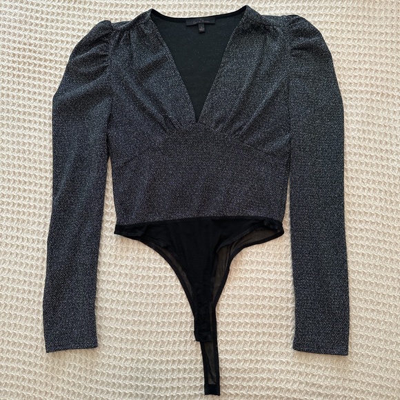 Black glitter body suit. Size large. Lightly worn. - Picture 1 of 3